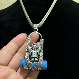 Turquoise Gemstone-Child Angel On A Swing.